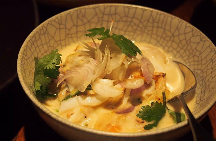 Coconut and turmeric curry of blue swimmer crab with calamansi lime